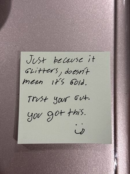 Handwritten sticky note with words of encouragement